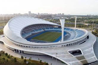 Steel structure roof of Wuyuanhe Gymnasium in Haikou, radiating fish-bellied truss structure roof