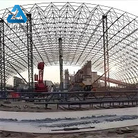 Interior view of large-span coal shed tubular steel truss under construction. Thermal stress relief nodes are adopted to release cyclic temperature deformation and prevent long-term weld fatigue cracking in open mining environments
